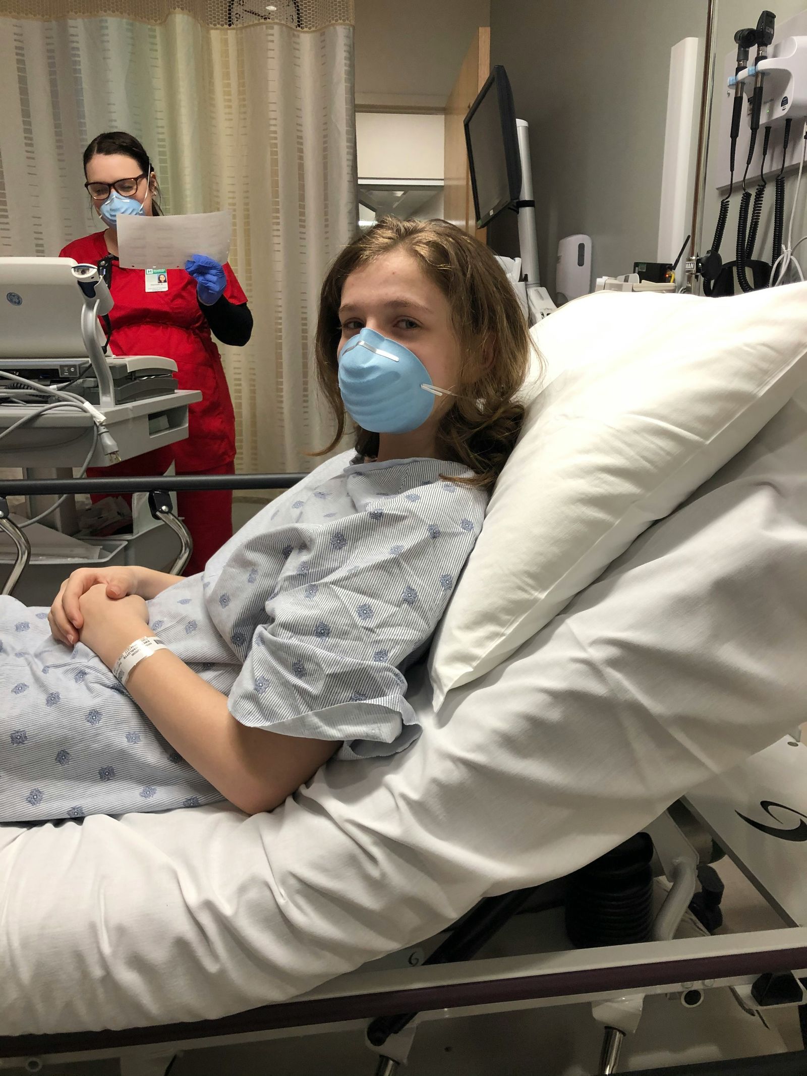 A patient resting in a hospital bed