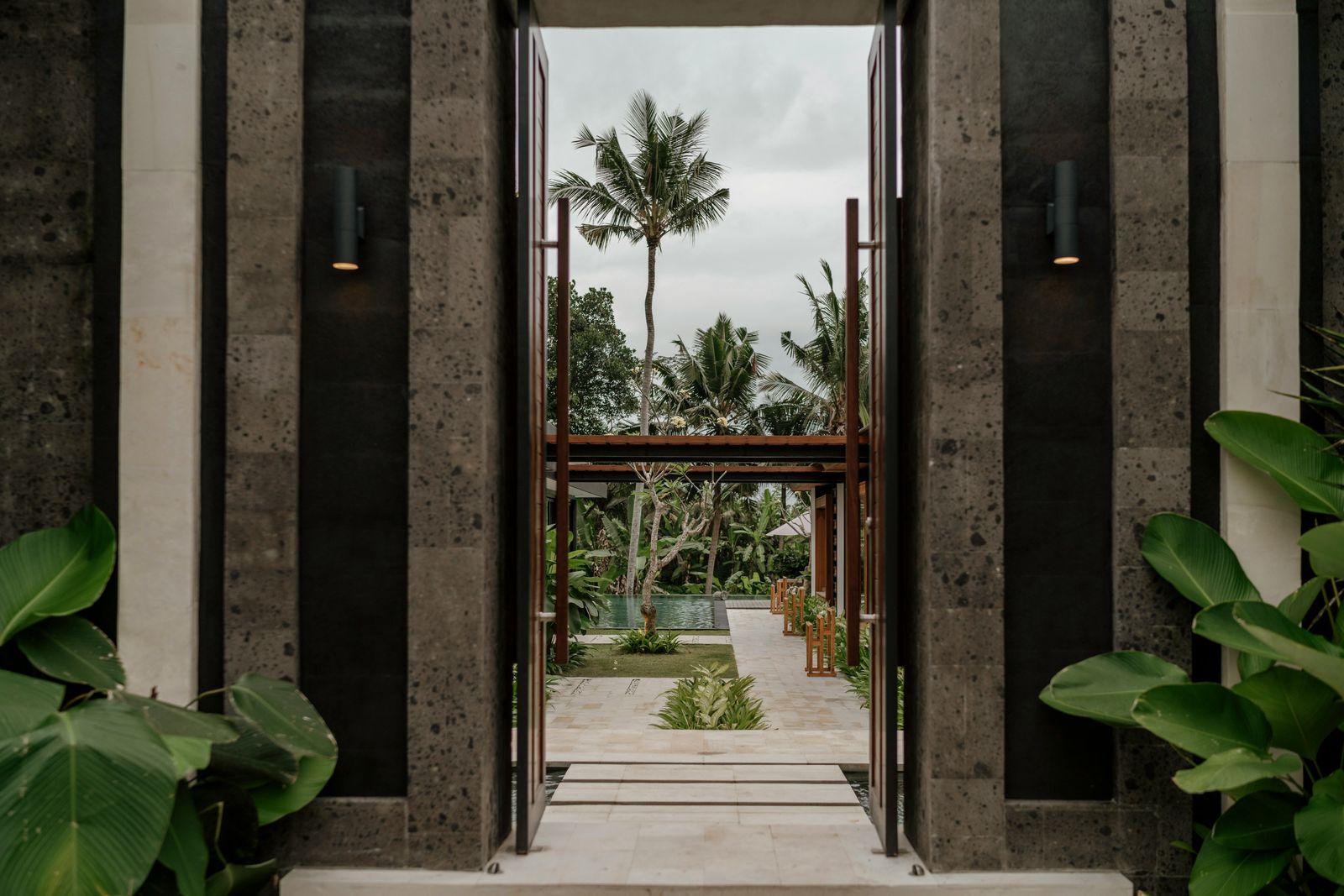 Private villa garden entrance in Bali with tropical greenery