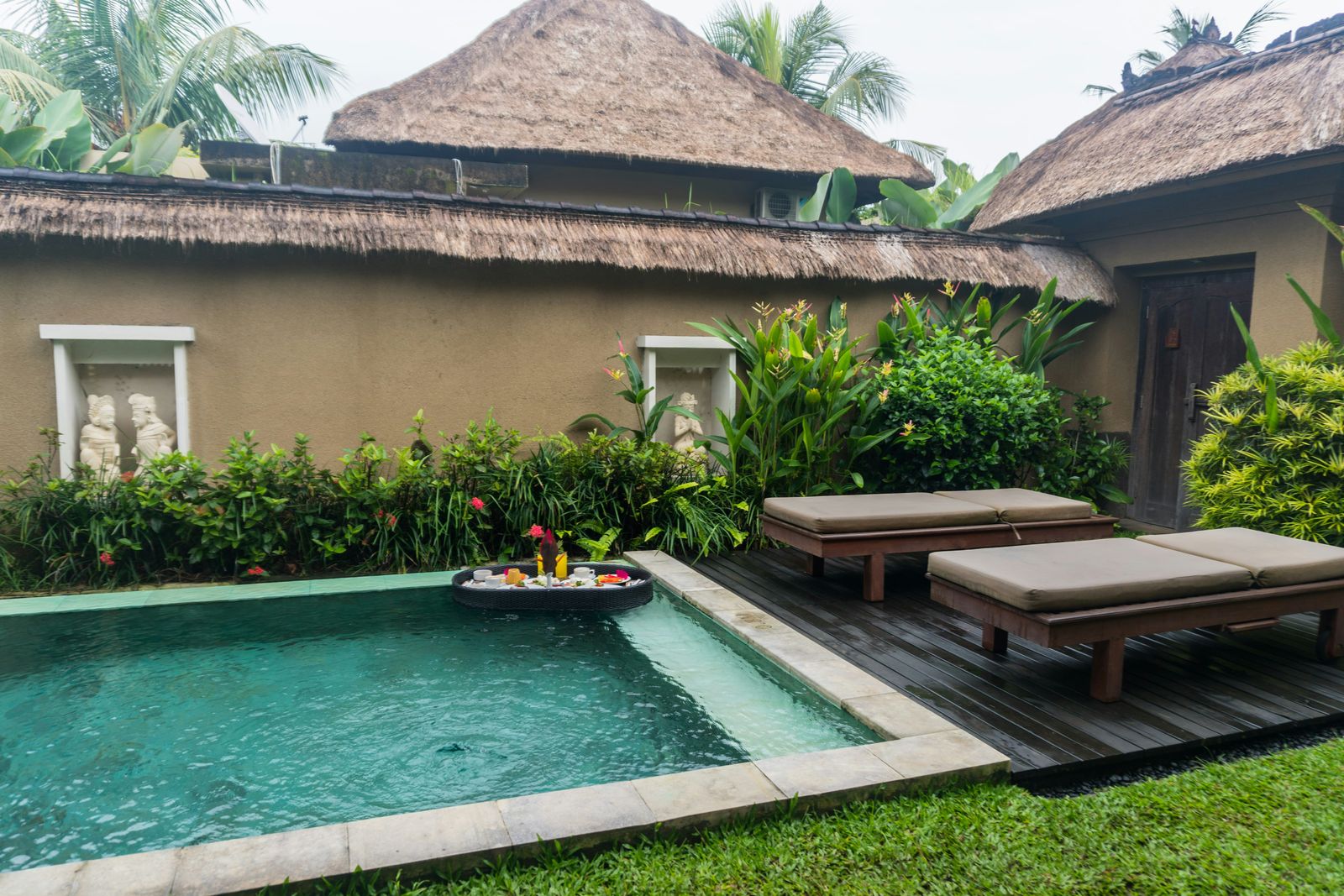 Secure private villa courtyard in Ubud with tropical greenery and a pool