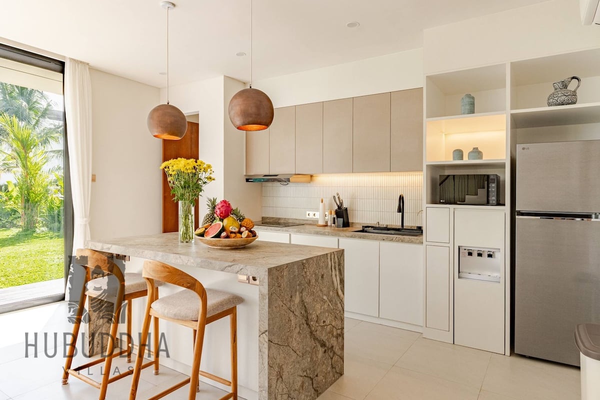 Modern kitchen with island at Hubuddha Two Bedroom Villa Ubud Bali